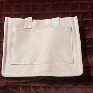 Pink multi purpose bag with several pockets…never used